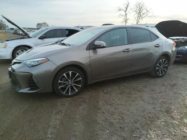 TOYOTA COROLLA L 2018 with VIN 2T1BURHE3JC022308 - Photo from auction