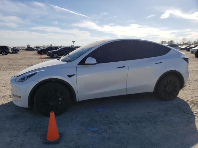 TESLA MODEL Y 2022 with VIN 7SAYGDEE8NA011122 - Photo from auction