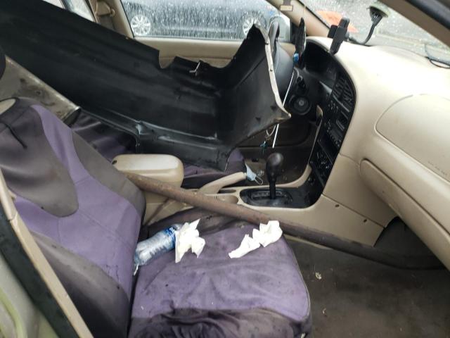 Photo 7 from auction – 2000 KIA SEPHIA with VIN KNAFB1217Y5825366