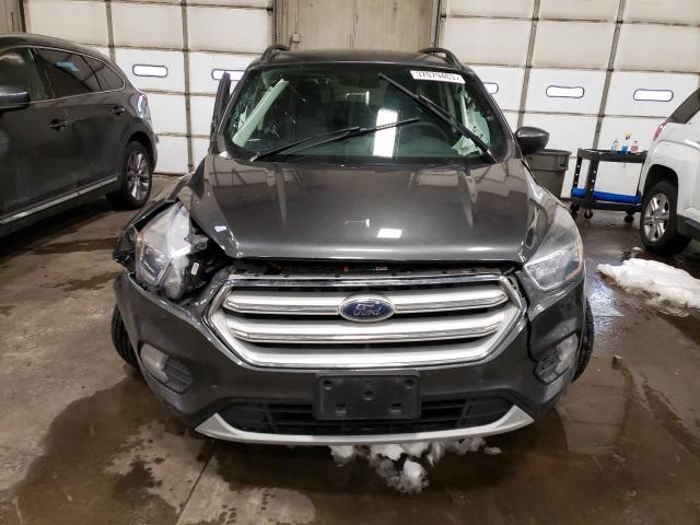 Photo 5 from auction – 2018 FORD ESCAPE SE with VIN 1FMCU9GD1JUC20509
