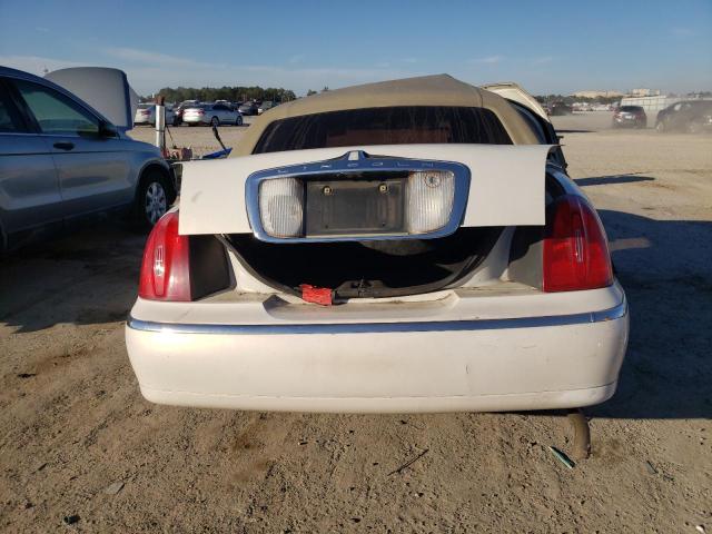 Photo 6 from auction – 2000 LINCOLN TOWN CAR E with VIN 1LNHM81W4YY844012