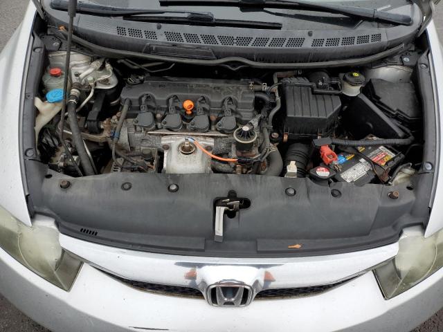 Photo 11 from auction – 2011 HONDA CIVIC LX with VIN 19XFA1F52BE038176
