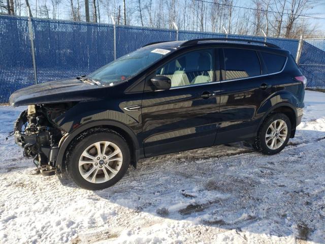 FORD ESCAPE SE 2018 with VIN 1FMCU9GD8JUC15016 - Photo from auction
