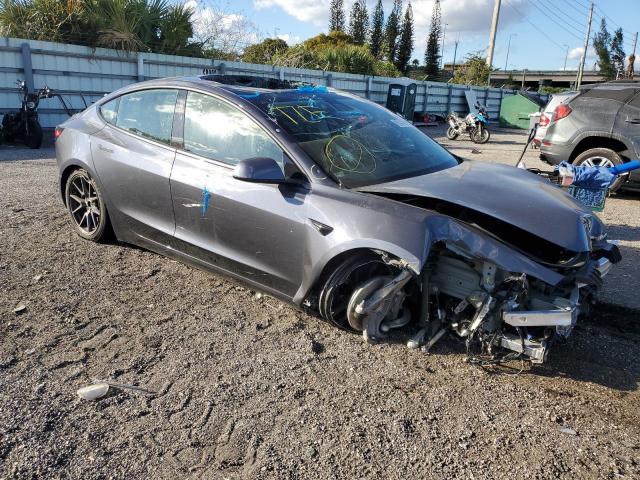 Photo 4 from auction – 2021 TESLA MODEL 3 with VIN 5YJ3E1EA8MF086350
