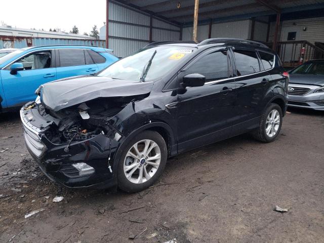 FORD ESCAPE SE 2018 with VIN 1FMCU9GD7JUC16318 - Photo from auction