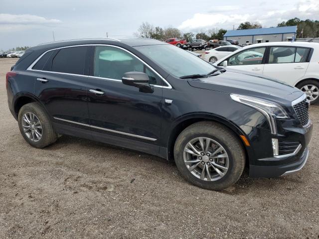 Photo 4 from auction – 2021 CADILLAC XT5 PREMIU with VIN 1GYKNCRS9MZ106958