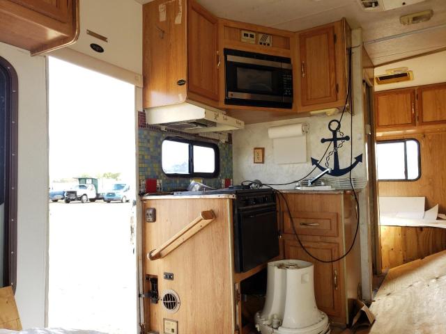 Photo 6 from auction – 1999 FORD ECONOLINE with VIN 1FDWE30S2XHA44703