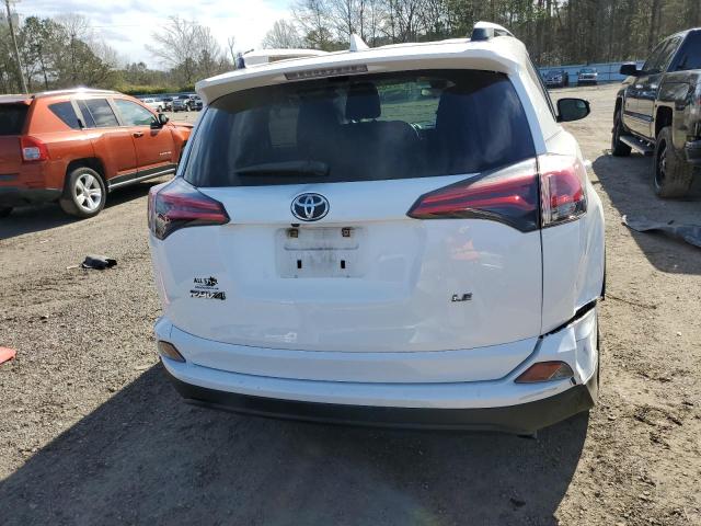 Photo 6 from auction – 2018 TOYOTA RAV4 LE with VIN JTMZFREV5JD129831