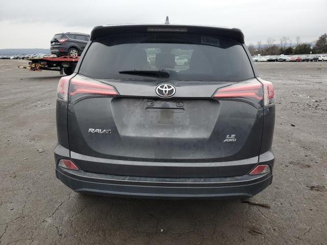 Photo 6 from auction – 2018 TOYOTA RAV4 LE with VIN JTMBFREV0JJ730096