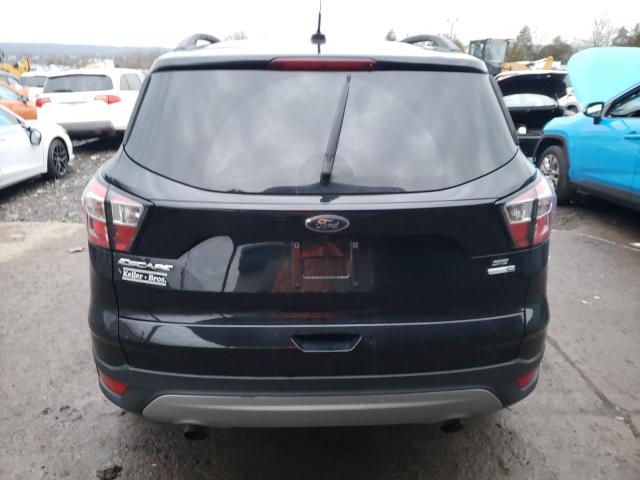 Photo 6 from auction – 2018 FORD ESCAPE SE with VIN 1FMCU9GD7JUC16318
