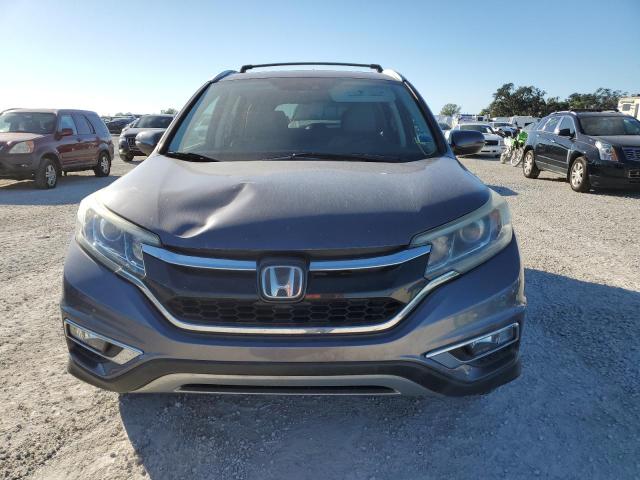 Photo 5 from auction – 2016 HONDA CR-V TOURI with VIN 5J6RM3H98GL009483