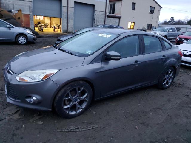 FORD FOCUS 2014 with VIN 1FADP3F20EL221312 - Photo from auction