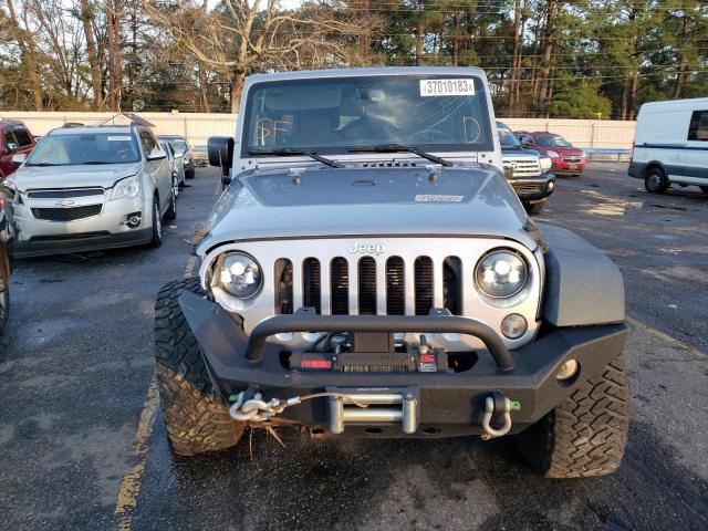 Photo 5 from auction – 2016 JEEP WRANGLER U with VIN 1C4BJWDG5GL225717