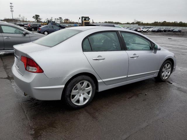 Photo 3 from auction – 2011 HONDA CIVIC LX with VIN 19XFA1F52BE038176