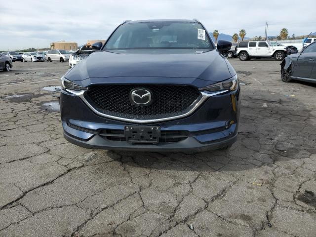 Photo 5 from auction – 2021 MAZDA CX-5 SIGNA with VIN JM3KFBEY0M0421702
