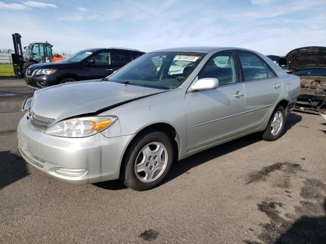 TOYOTA CAMRY LE 2002 with VIN JTDBE32K220123036 - Photo from auction