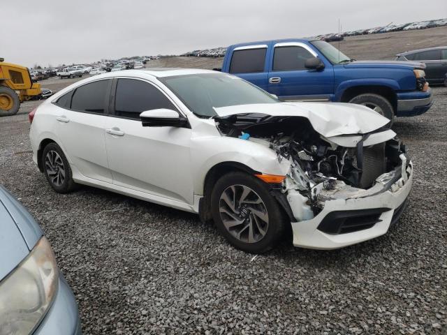 Photo 4 from auction – 2018 HONDA CIVIC EX with VIN 19XFC2F7XJE008083
