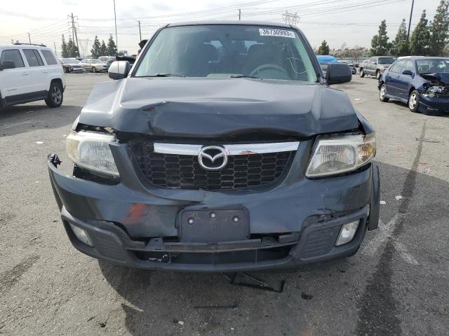 Photo 5 from auction – 2010 MAZDA TRIBUTE I with VIN 4F2CY0C70AKM01567