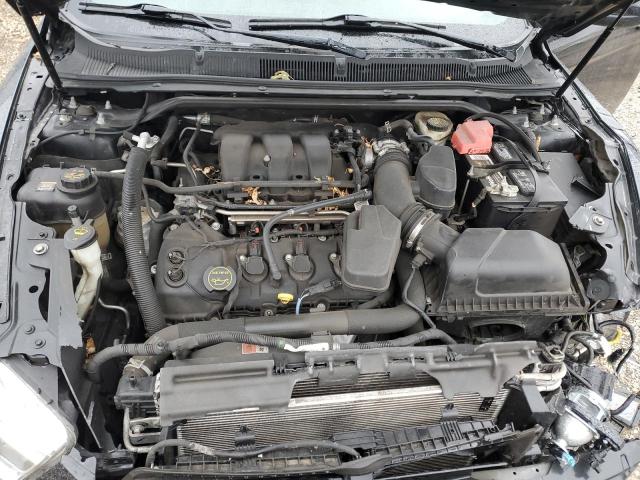 Photo 11 from auction – 2015 FORD TAURUS SEL with VIN 1FAHP2E87FG208620
