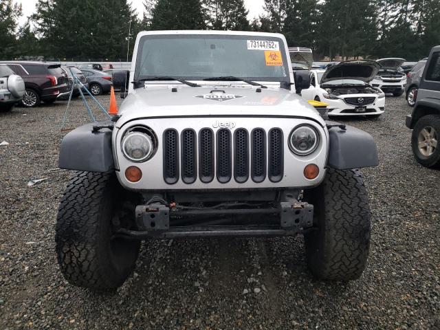 Photo 5 from auction – 2011 JEEP WRANGLER U with VIN 1J4BA5H13BL600345