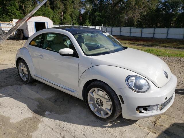 Photo 4 from auction – 2014 VOLKSWAGEN BEETLE with VIN 3VWJP7AT7EM628124