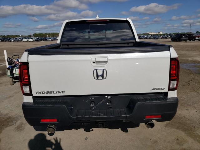 Photo 6 from auction – 2023 HONDA RIDGELINE with VIN 5FPYK3F56PB010312