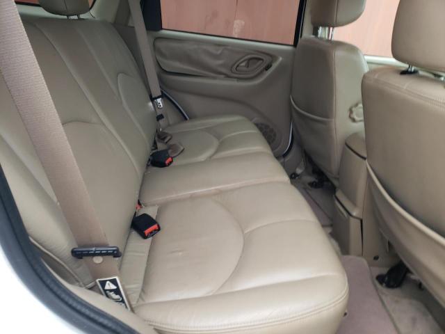 Photo 11 from auction – 2003 MAZDA TRIBUTE ES with VIN 4F2CZ06193KM38463