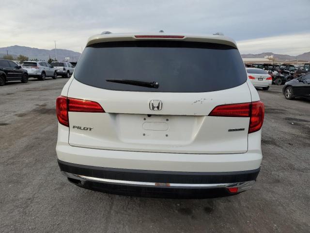 Photo 6 from auction – 2018 HONDA PILOT TOUR with VIN 5FNYF5H98JB032053