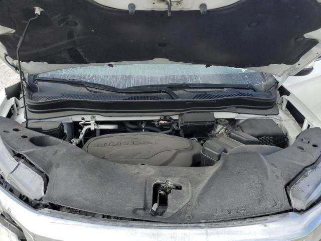 Photo 12 from auction – 2021 HONDA PILOT TOUR with VIN 5FNYF5H92MB010344