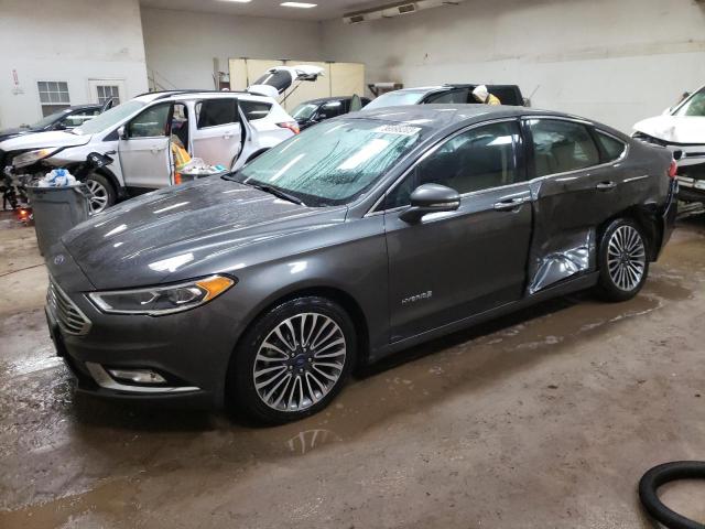 FORD FUSION TIT 2018 with VIN 3FA6P0RU3JR234099 - Photo from auction