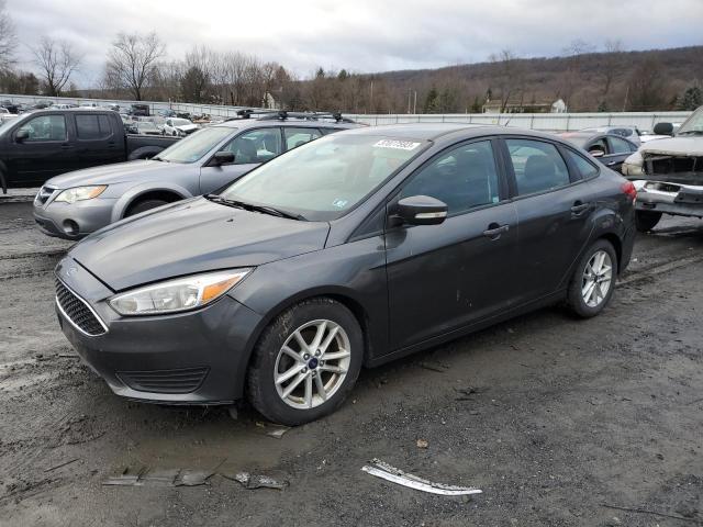 FORD FOCUS SE 2016 with VIN 1FADP3F24GL240724 - Photo from auction