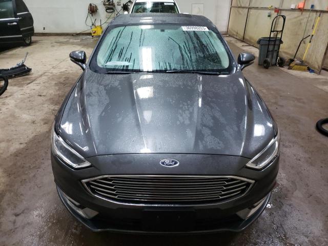 Photo 5 from auction – 2018 FORD FUSION TIT with VIN 3FA6P0RU3JR234099