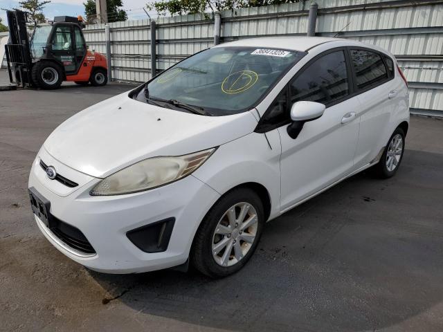 FORD FIESTA SE 2011 with VIN 3FADP4EJ0BM118738 - Photo from auction