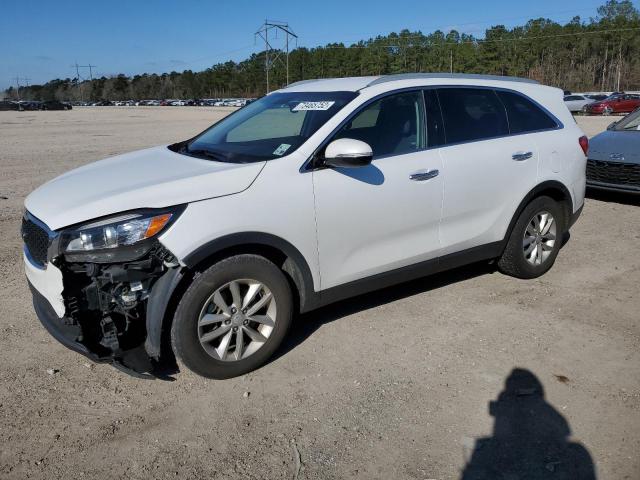 KIA SORENTO LX 2016 with VIN 5XYPG4A58GG010808 - Photo from auction