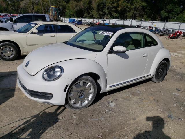 VOLKSWAGEN BEETLE 2014 with VIN 3VWJP7AT7EM628124 - Photo from auction