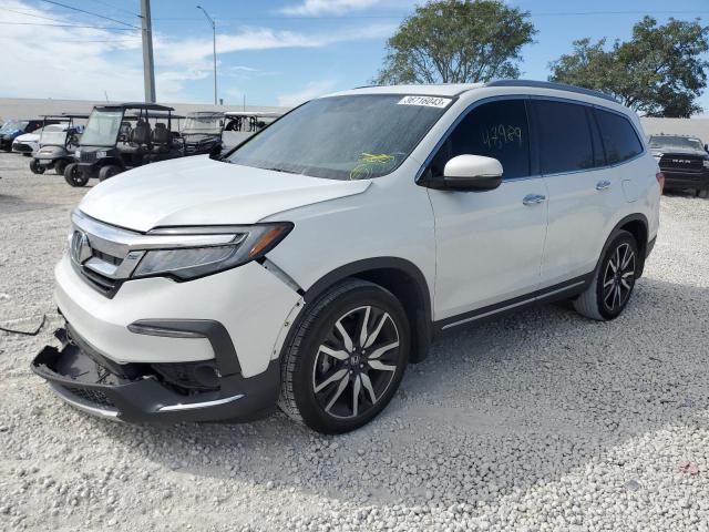 HONDA PILOT TOUR 2021 with VIN 5FNYF5H92MB010344 - Photo from auction
