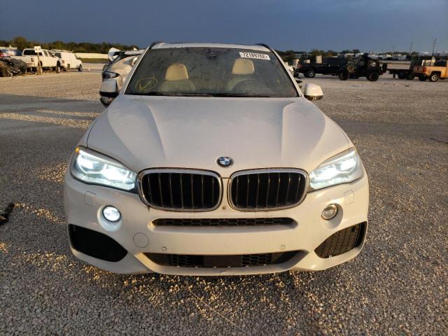 Photo 5 from auction – 2014 BMW X5 XDRIVE3 with VIN 5UXKS4C56E0J93908