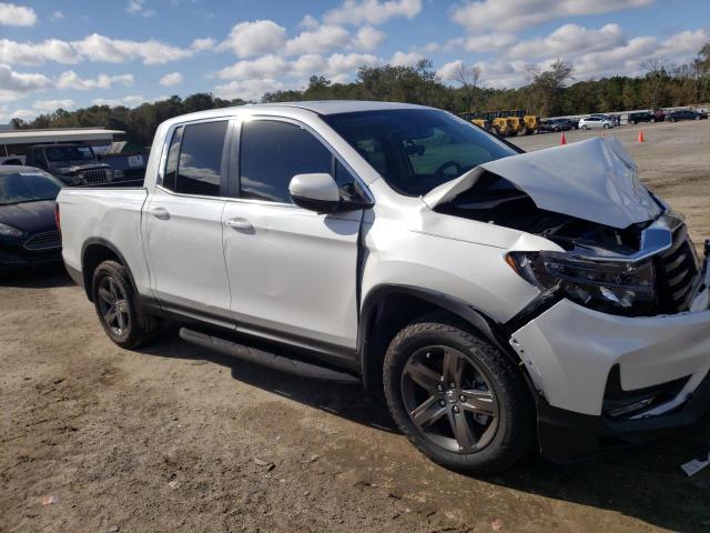 Photo 4 from auction – 2023 HONDA RIDGELINE with VIN 5FPYK3F56PB010312