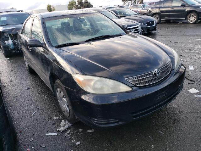 Photo 4 from auction – 2002 TOYOTA CAMRY LE with VIN JTDBE32K920111174