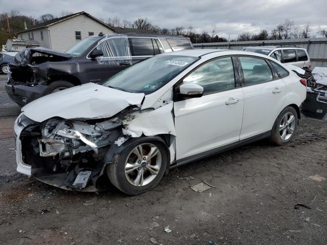 FORD FOCUS 2013 with VIN 1FADP3F2XDL312831 - Photo from auction