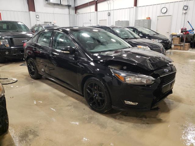 Photo 4 from auction – 2016 FORD FOCUS SE with VIN 1FADP3F20GL357913