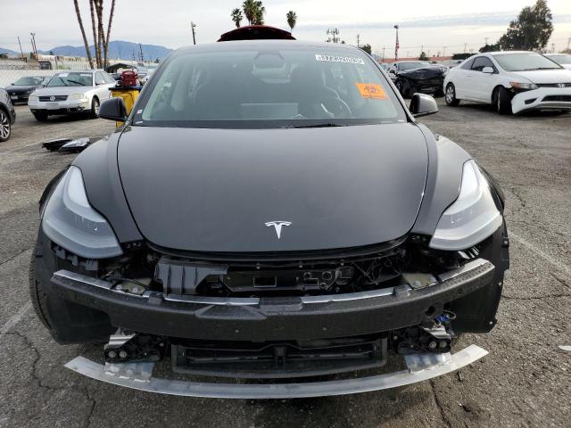 Photo 5 from auction – 2022 TESLA MODEL 3 with VIN 5YJ3E1EB4NF191039
