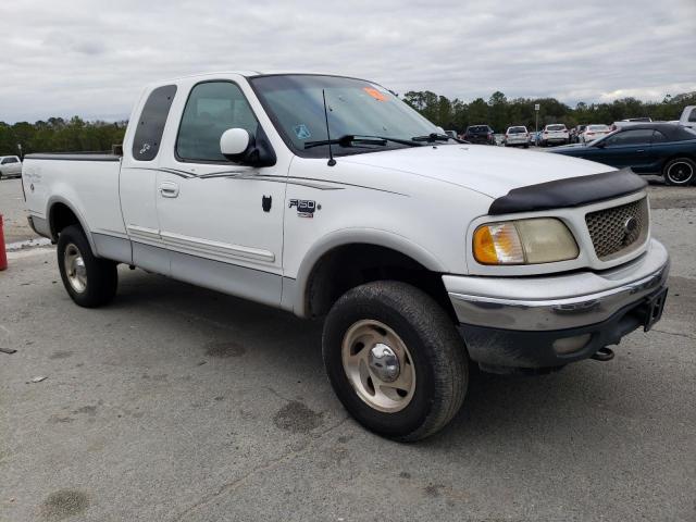 Photo 4 from auction – 2000 FORD F150 with VIN 1FTRX18L5YNA12201