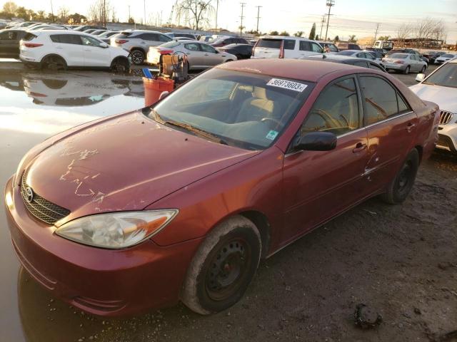 TOYOTA CAMRY LE 2002 with VIN JTDBE32KX20030796 - Photo from auction