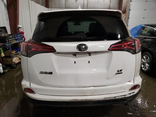 Photo 6 from auction – 2018 TOYOTA RAV4 LE with VIN 2T3BFREV1JW768552