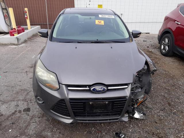 Photo 5 from auction – 2014 FORD FOCUS TITA with VIN 1FADP3J29EL367280