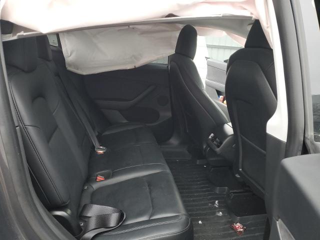 Photo 11 from auction – 2020 TESLA MODEL Y with VIN 5YJYGDEE0LF038151