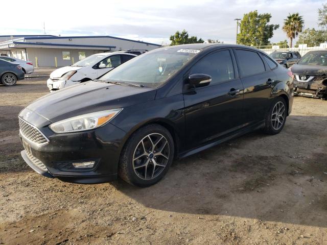 FORD FOCUS SE 2015 with VIN 1FADP3FE7FL328403 - Photo from auction