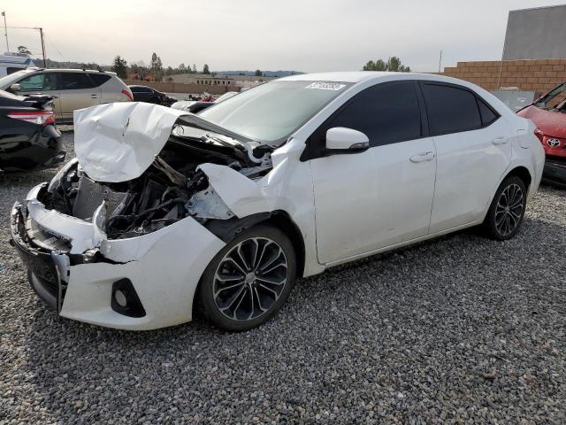 TOYOTA COROLLA L 2014 with VIN 5YFBURHE1EP069911 - Photo from auction