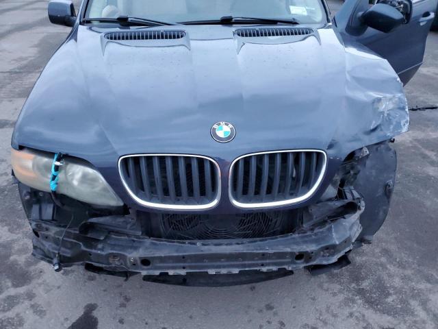 Photo 12 from auction – 2006 BMW X5 3.0I with VIN 5UXFA13526LY37147